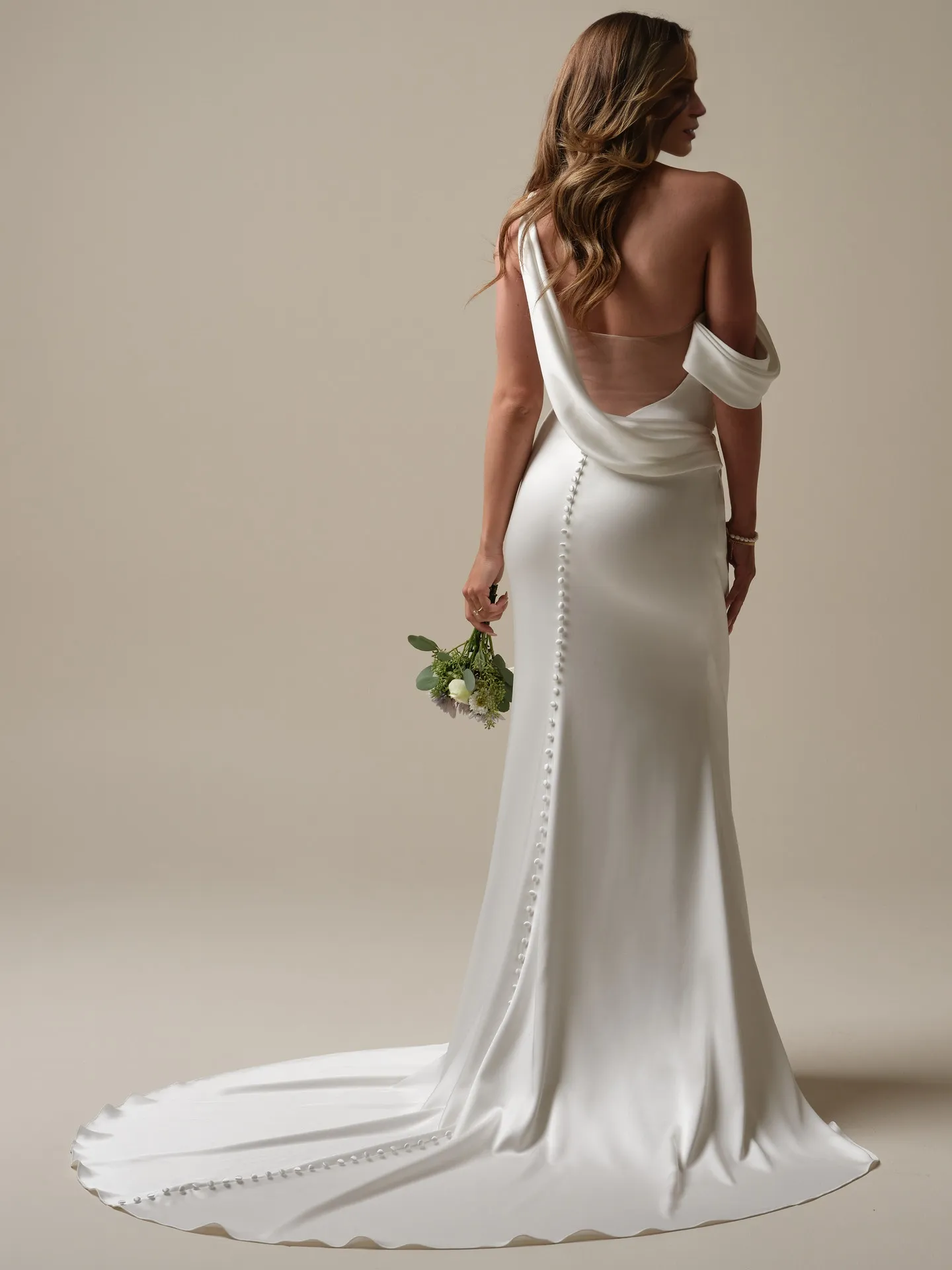 Asymmetric pleated cape tight and floor length wedding dress