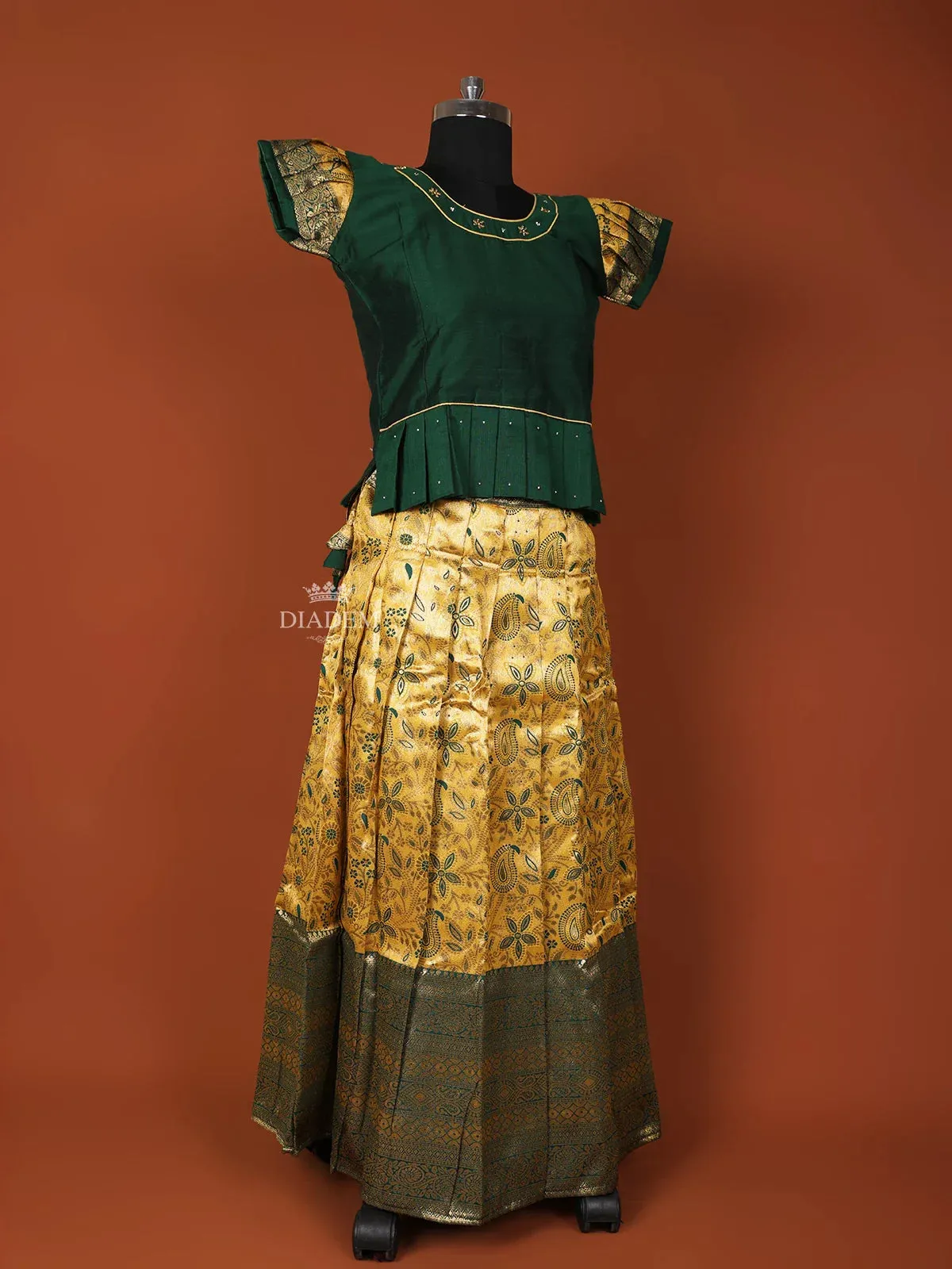 Dark Green Silk Pattu Pavadai Set Adorned with Stones and Zariwork