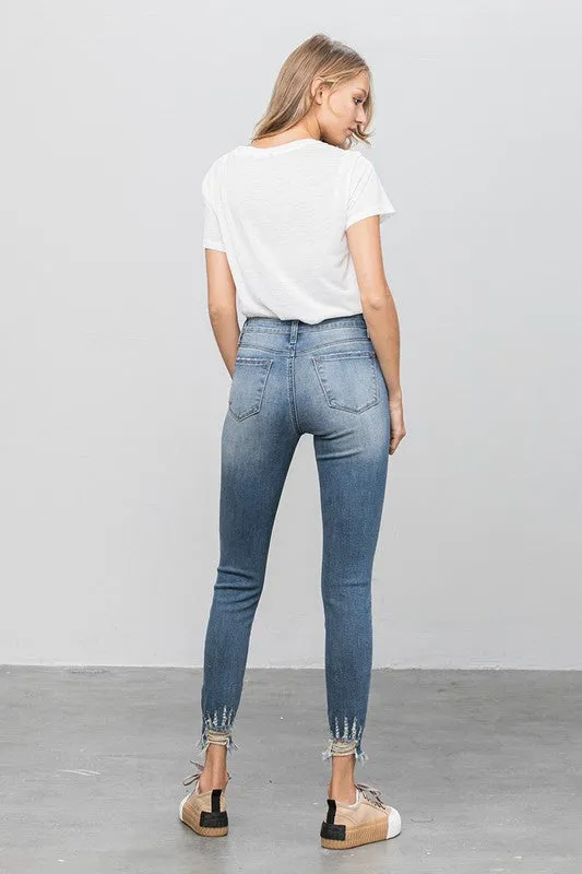 HIGH STRETCH MID RISE SKINNY JEANS