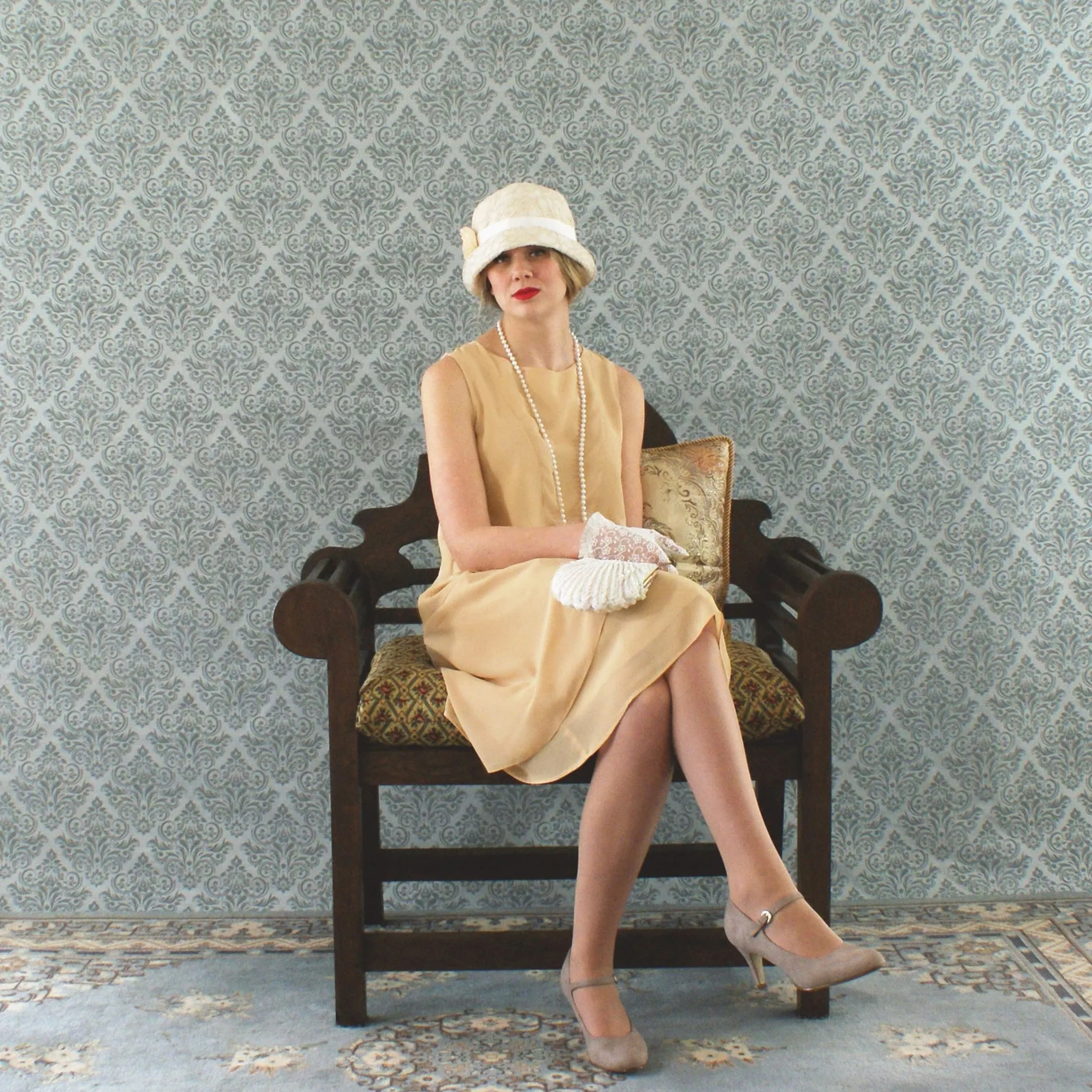 Pale marigold chiffon flapper dress with a ruffled skirt detail