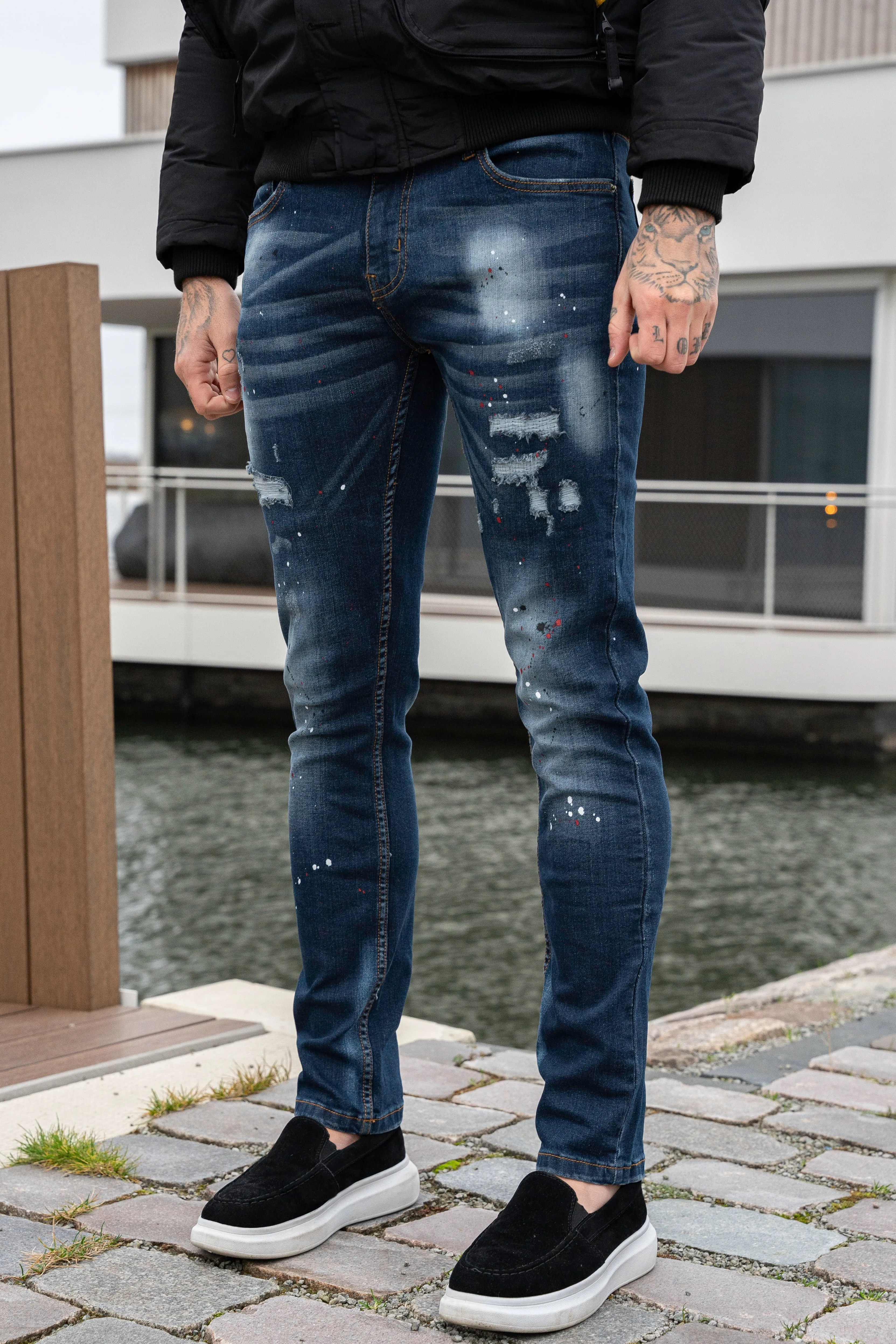 THE SANDRO SLIM FIT JEANS