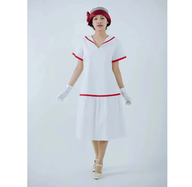 White cotton 1920s sailor dress with red or navy blue trim